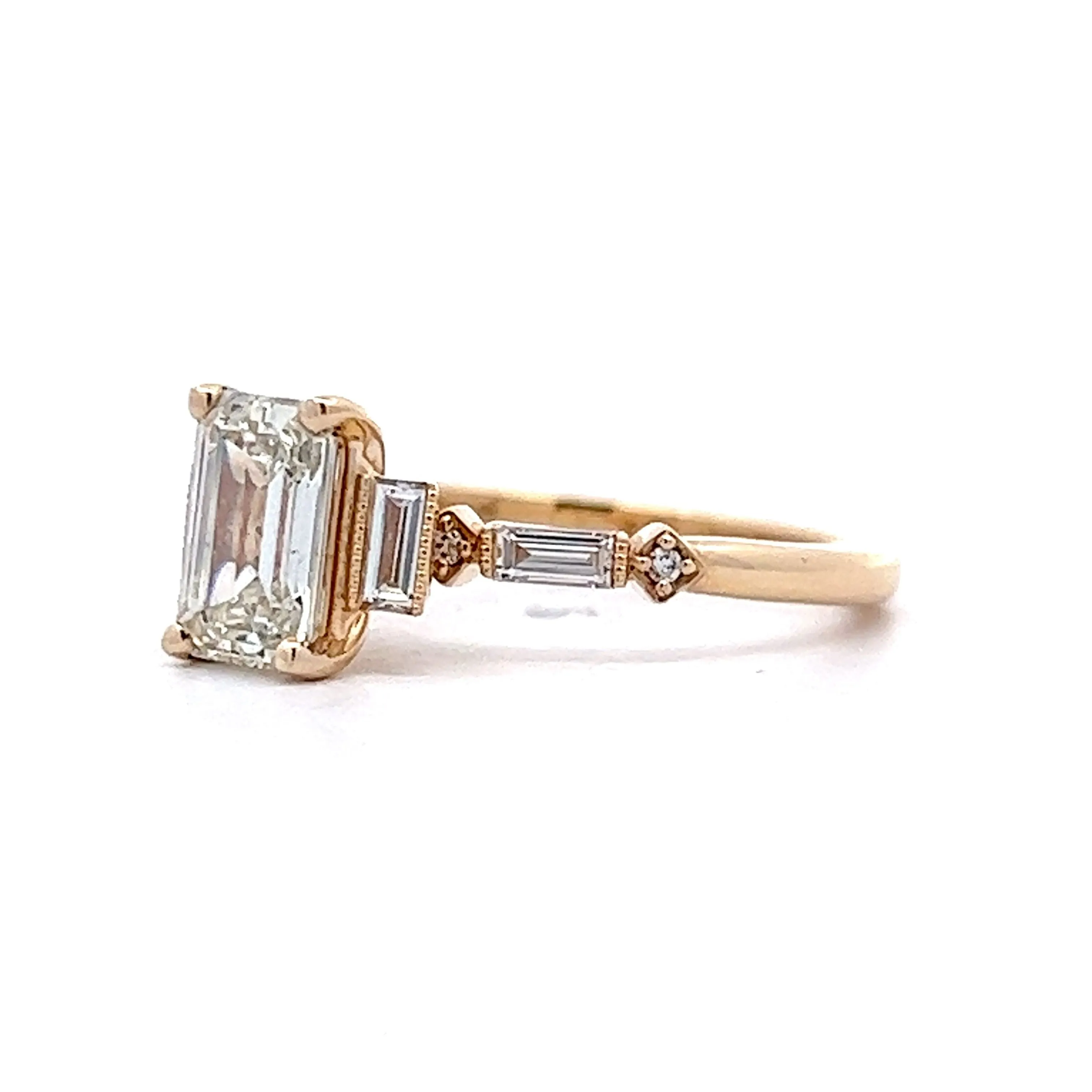 1.09 Emerald Cut Three Stone Engagement Ring in 14k Yellow Gold