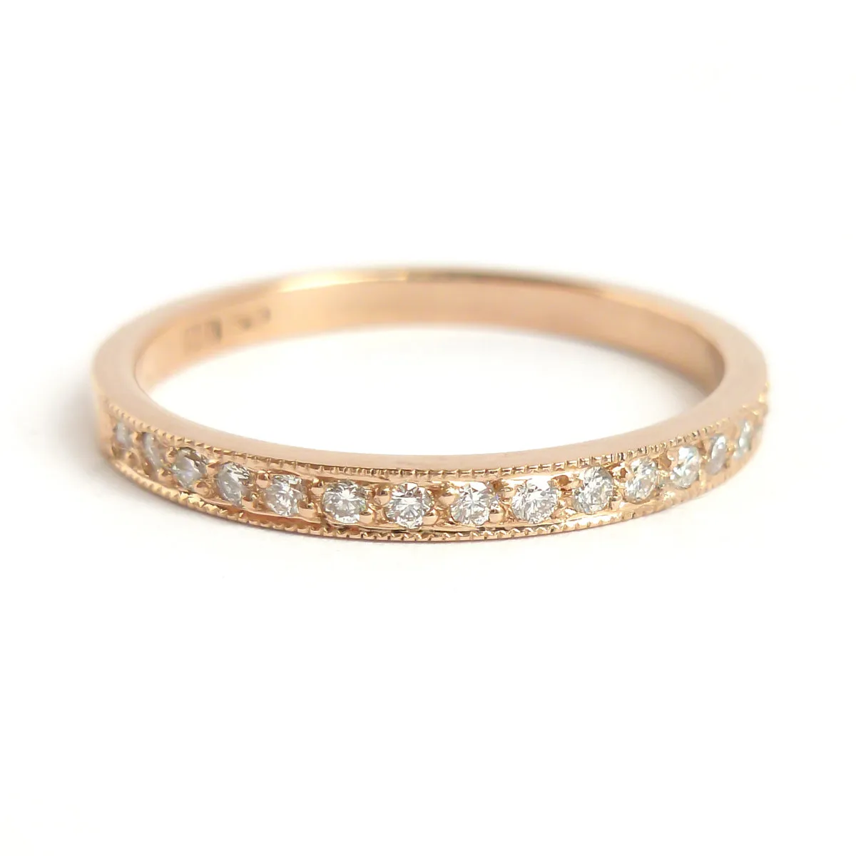 18ct rose gold and pave set diamond eternity ring