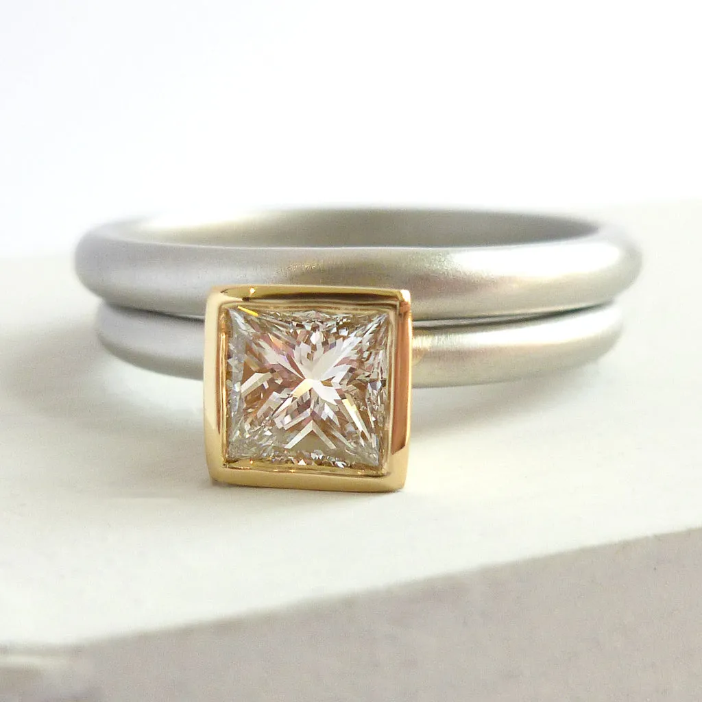 Contemporary platinum and diamond ring