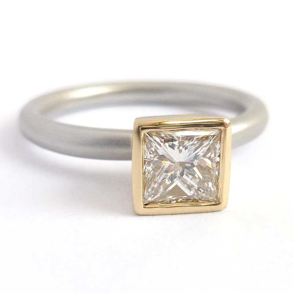 Contemporary platinum and diamond ring