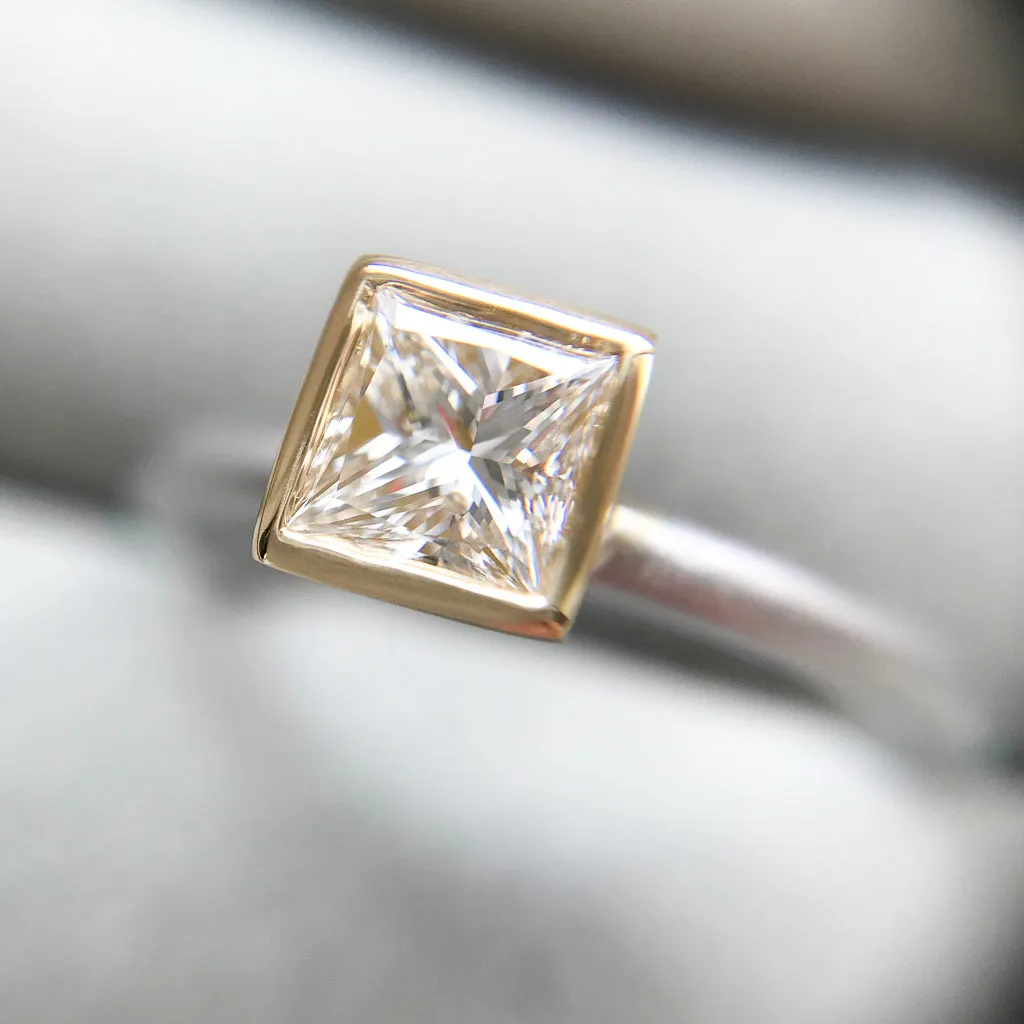 Contemporary platinum and diamond ring