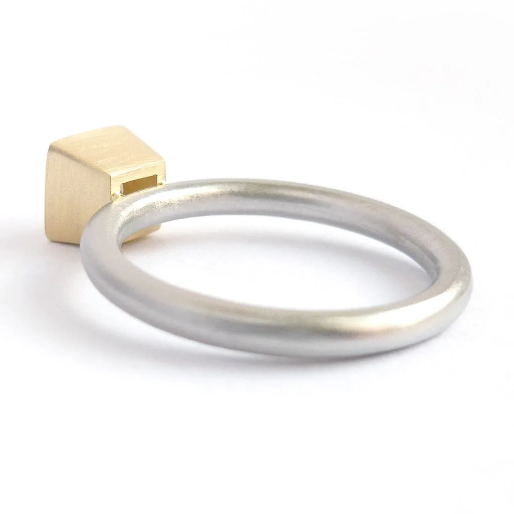 Contemporary platinum and diamond ring
