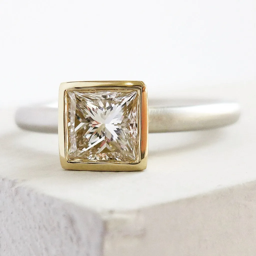 Contemporary platinum and diamond ring