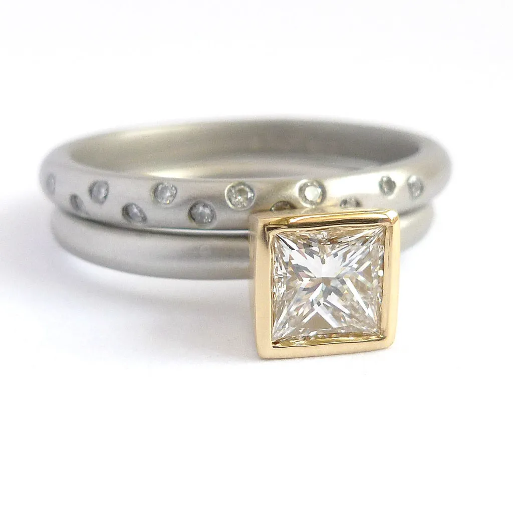 Contemporary platinum and diamond ring