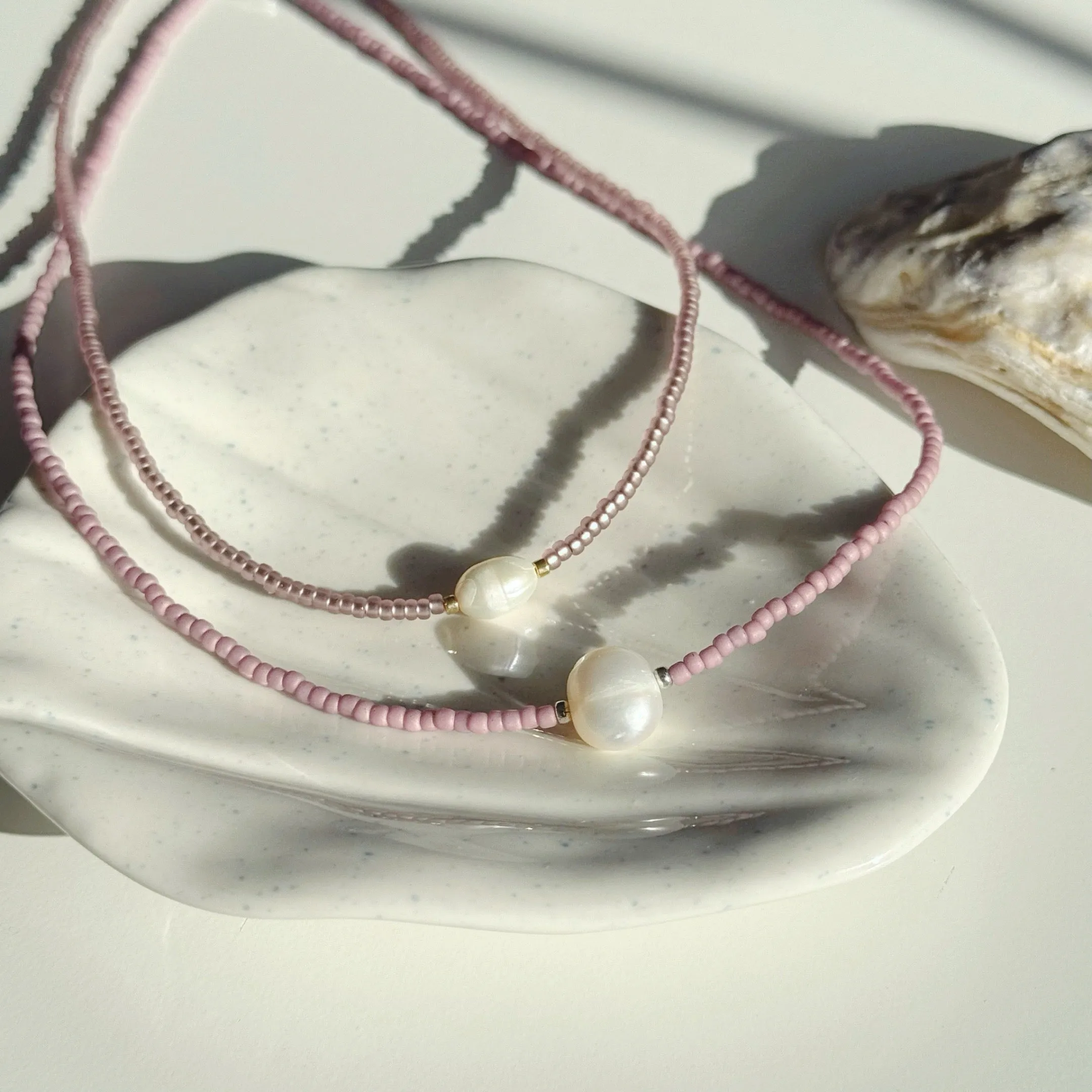 Glass bead necklaces with genuine freshwater pearls