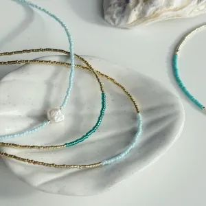 Gold and ocean blue necklaces