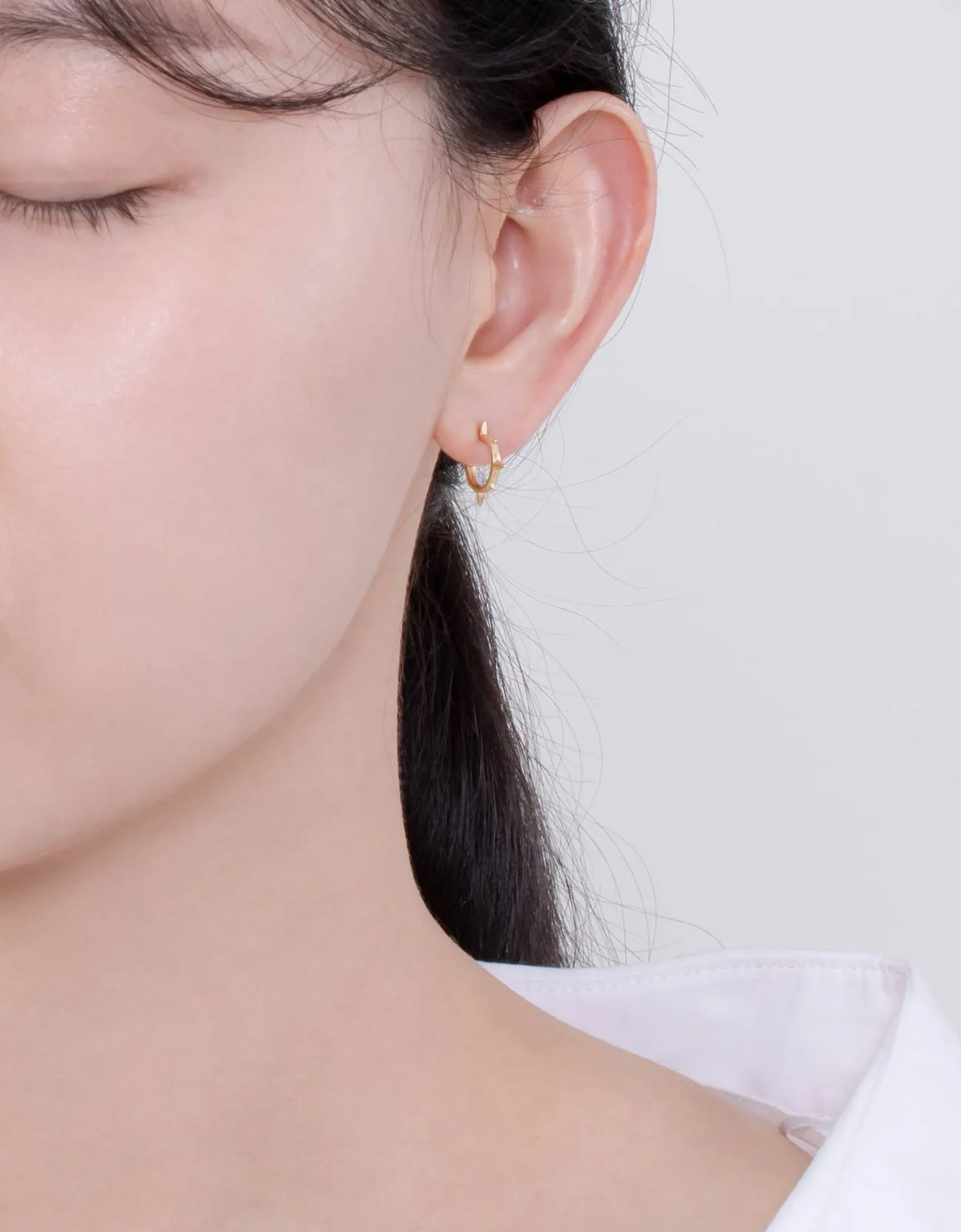Golden Edge Spike Sterling Silver Hoops for a Bold Look