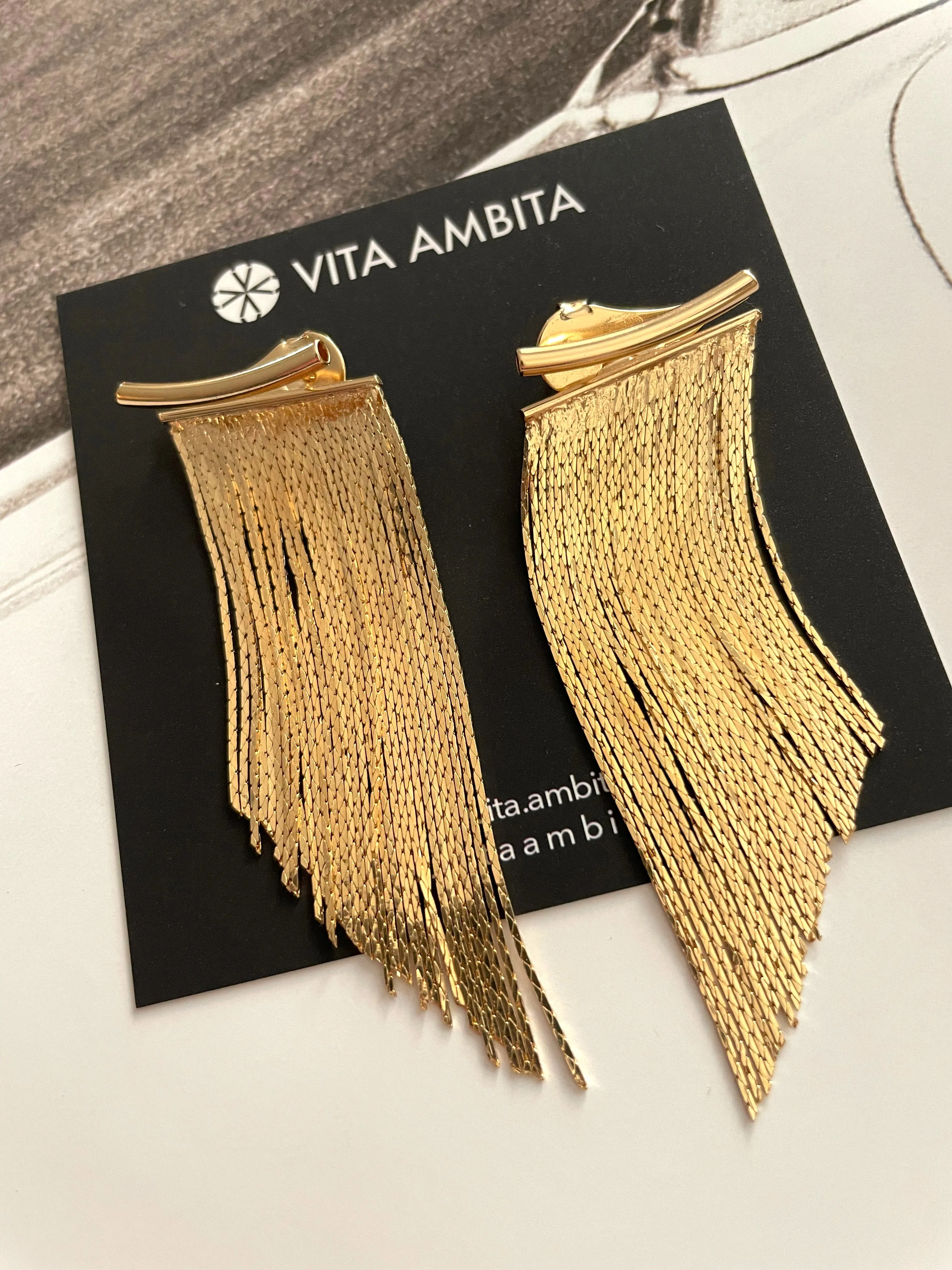 Golden tassel statement earrings