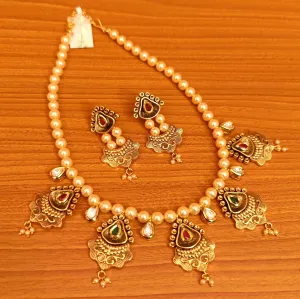 MULTICOLOUR ANTIQUE KUNDAN & PEARL ELEGANT NECKLACE SET