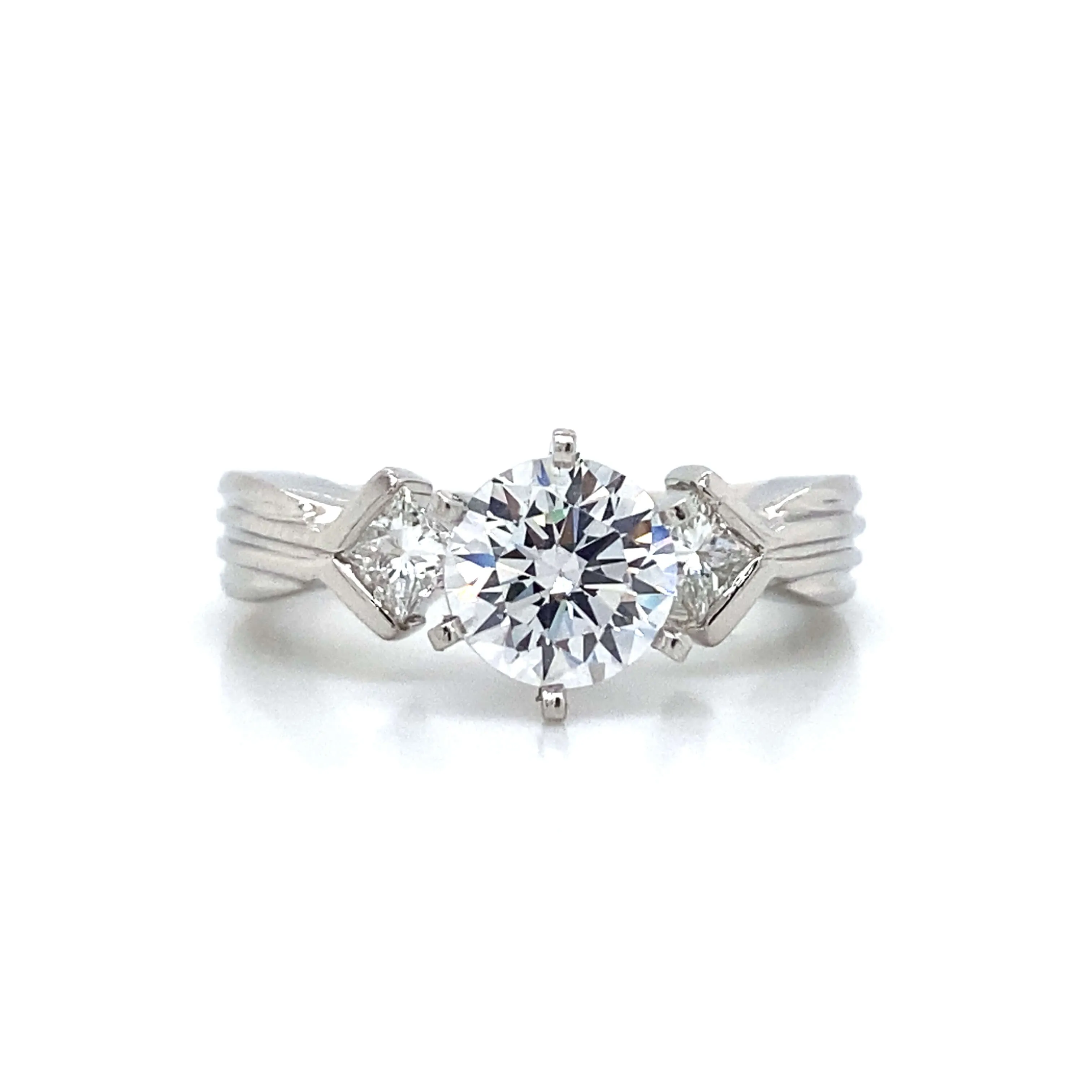 Three Stone Princess Shaped Engagement Ring in Platinum
