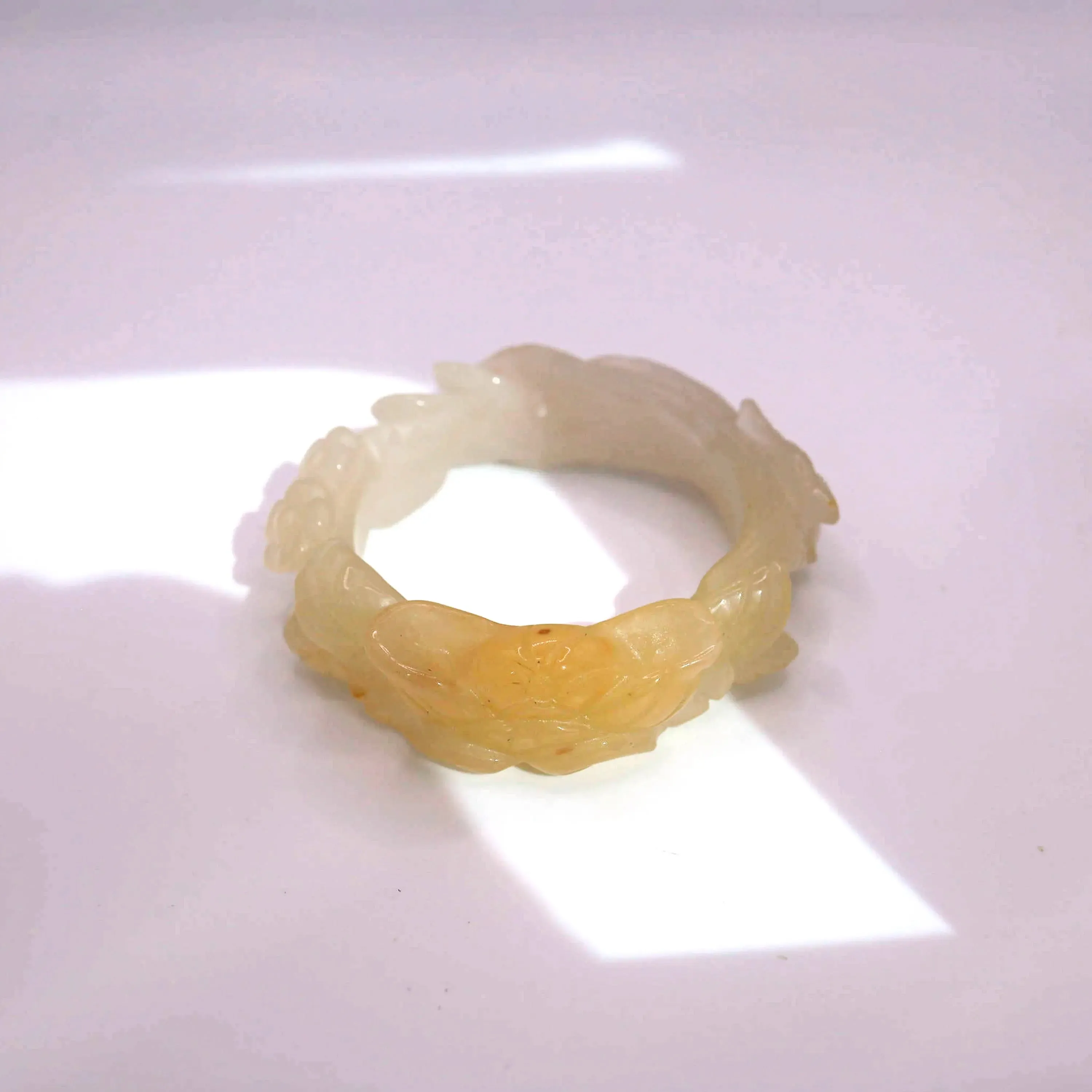 Yellow Jade Bangle – Carved Peony and Plum Blossom in Mongolian Stone